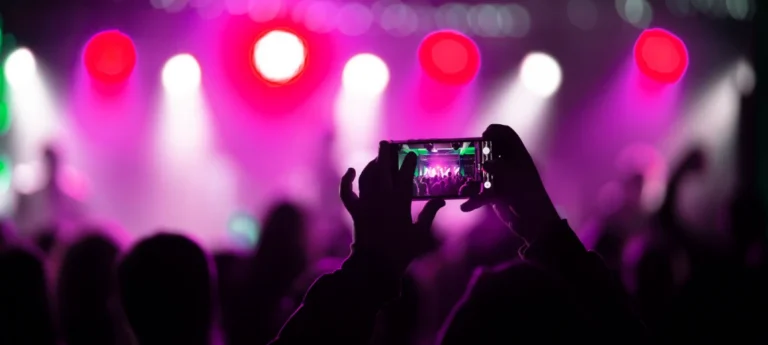 close-up-recording-video-with-smartphone-concert